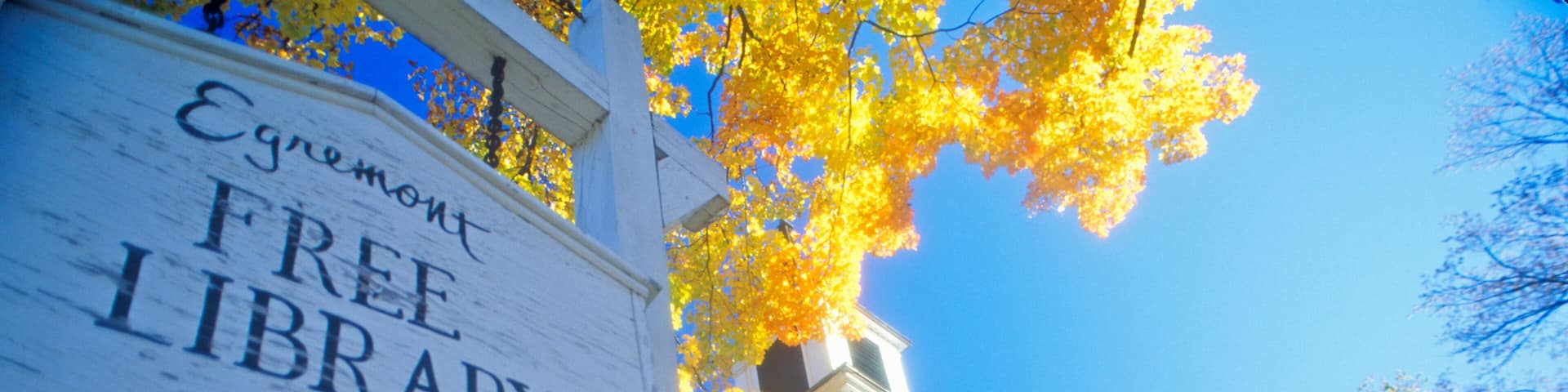 A white building with a sign that reads "Egnemont Free Library Archives."
