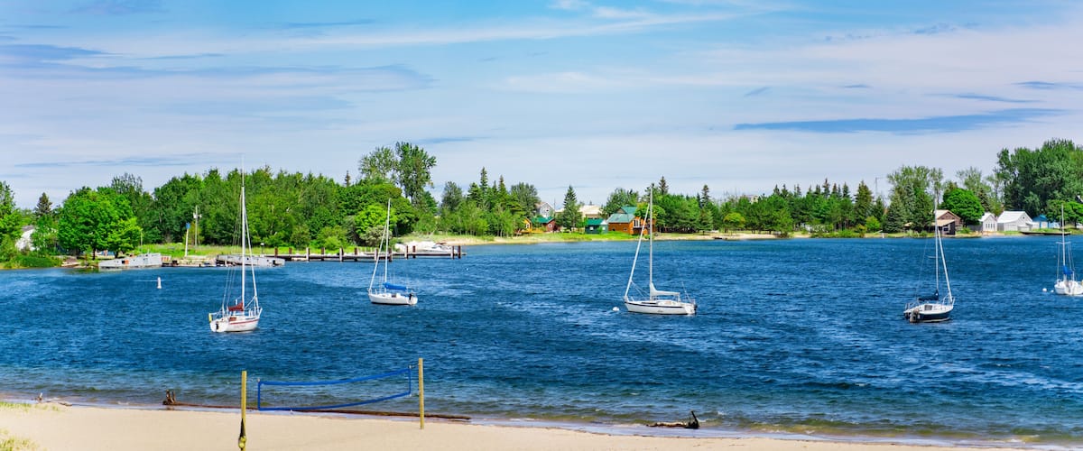 Photo of boats at a public beach in Grand Marais, MI