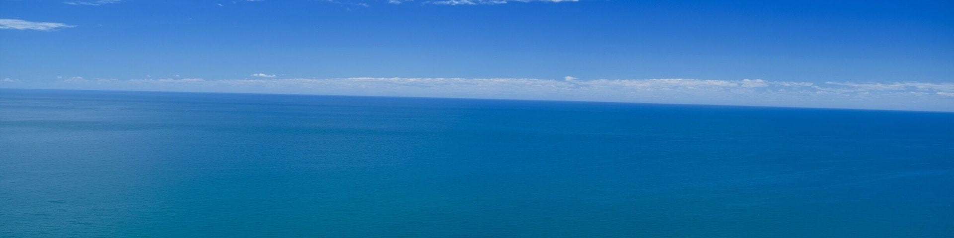 A view from the top of the Dunes as you enter the Pierce-Stocking Scenic Drive in Sleeping Bear Dunes National Lakeshore , Lake Michigan. This dune is 2,000 feet high. You are permitted to hike it. #blue #green