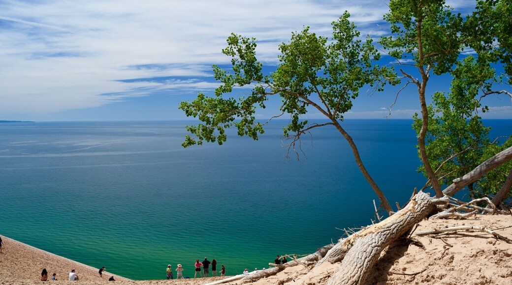 A view of Lake Michigan along the Pierce-Stocking Scenic Drive in Sleeping Bear Dunes National Lakeshore. The water is such a beautiful blue, with greens and teals nearer the shore. You can hike the dunes to the beach below, but be forewarned, the dunes are 2,000 feet high. It takes hours to climb back up, and often people have to be rescued because they can’t make the climb. #blue #green #AquaTrove #BVSBlue #AboveItAll
