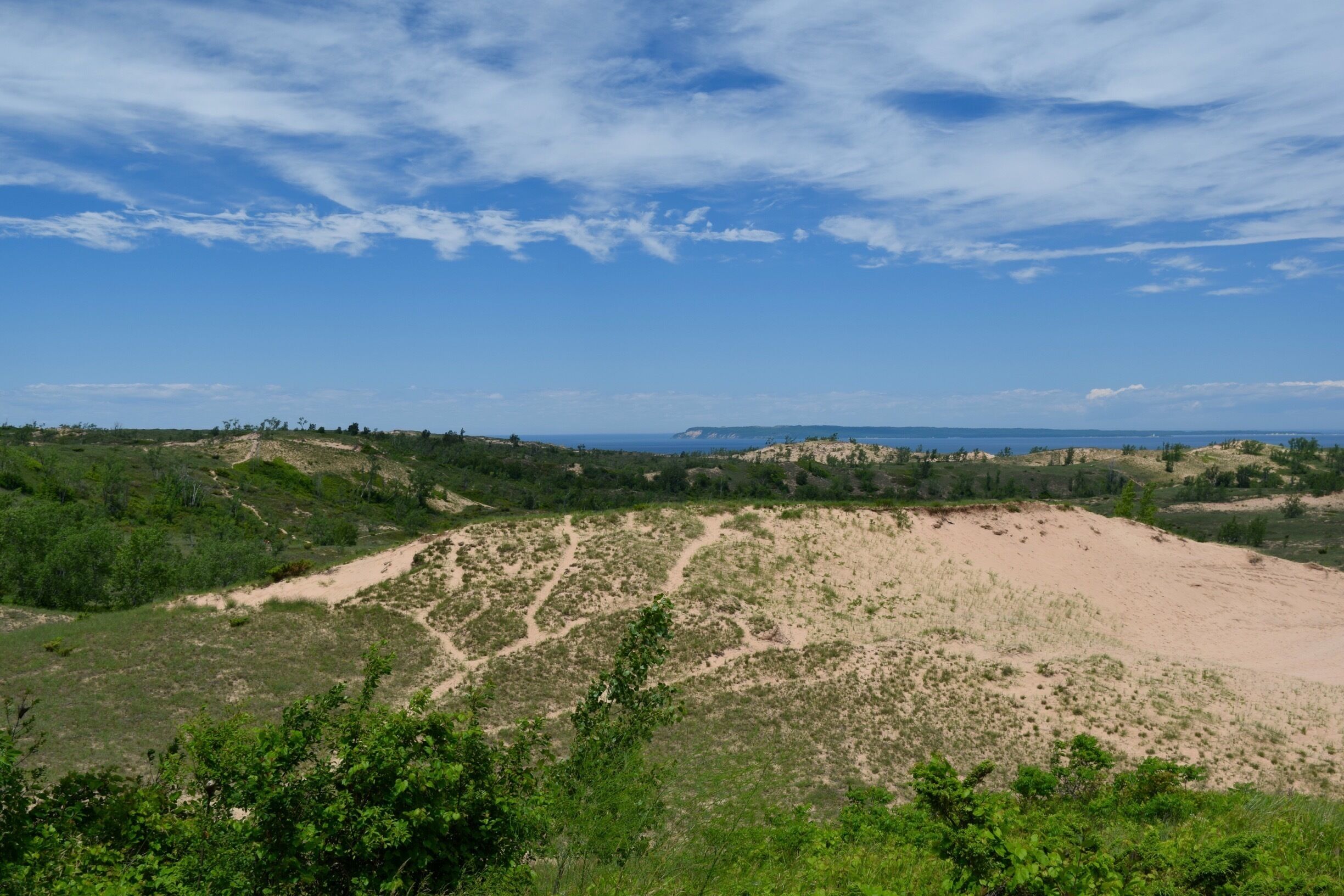This is the first glimpse of the Dunes as you enter the Pierce-Stocking Scenic Drive. It's a short seven mile loop through Sleeping Bear Dunes National Lakeshore with several overlooks of the Dunes and Lake Michigan. #blue #green