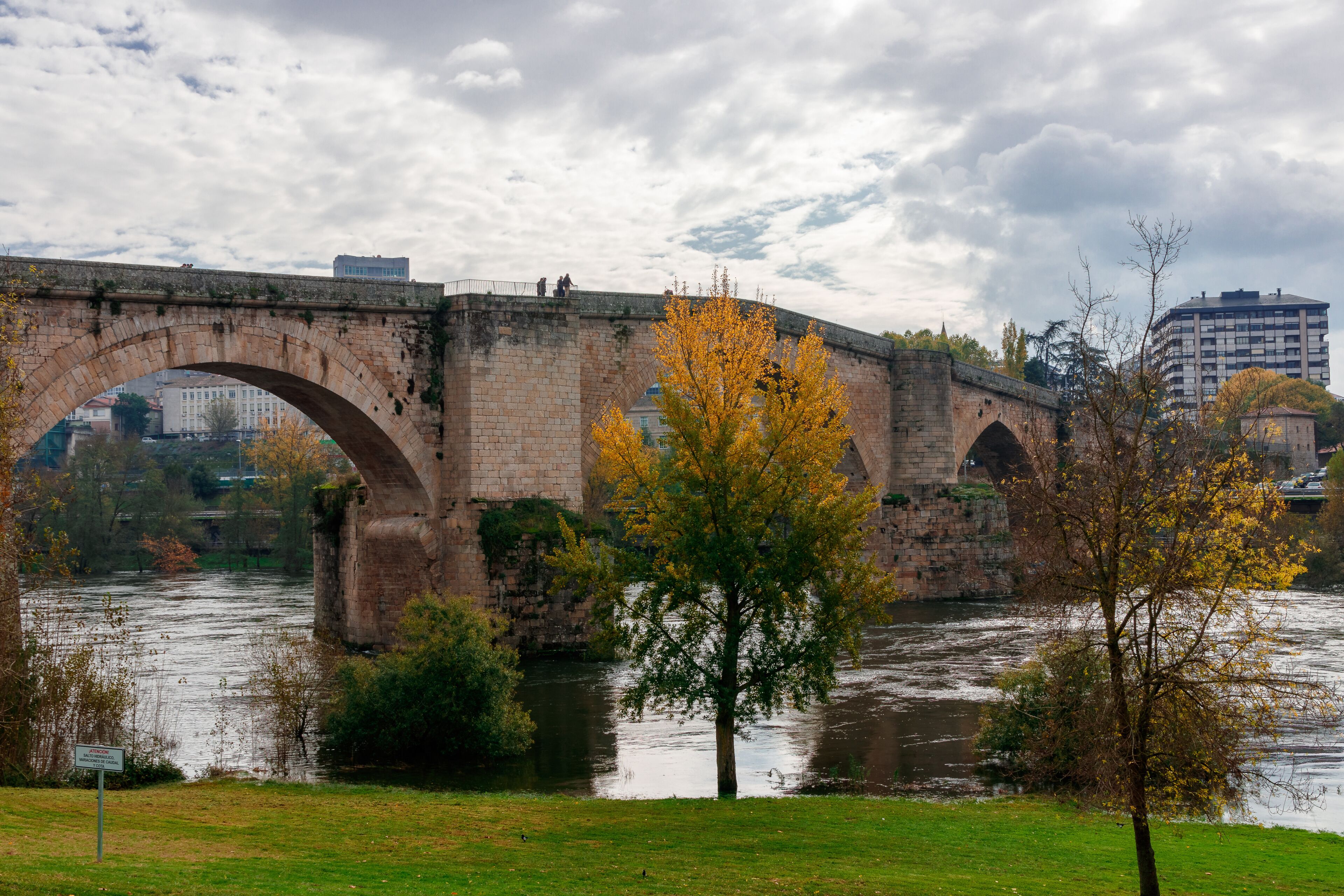 Beautiful shot of the Roman bridge over the River Mio in the city of Ourense in Galicia, Spain