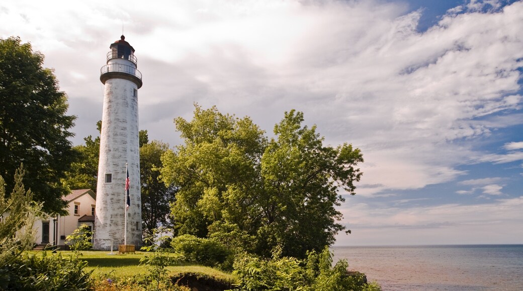 Port Austin featuring a lighthouse and general coastal views