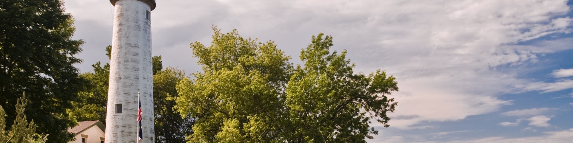 Port Austin featuring a lighthouse and general coastal views