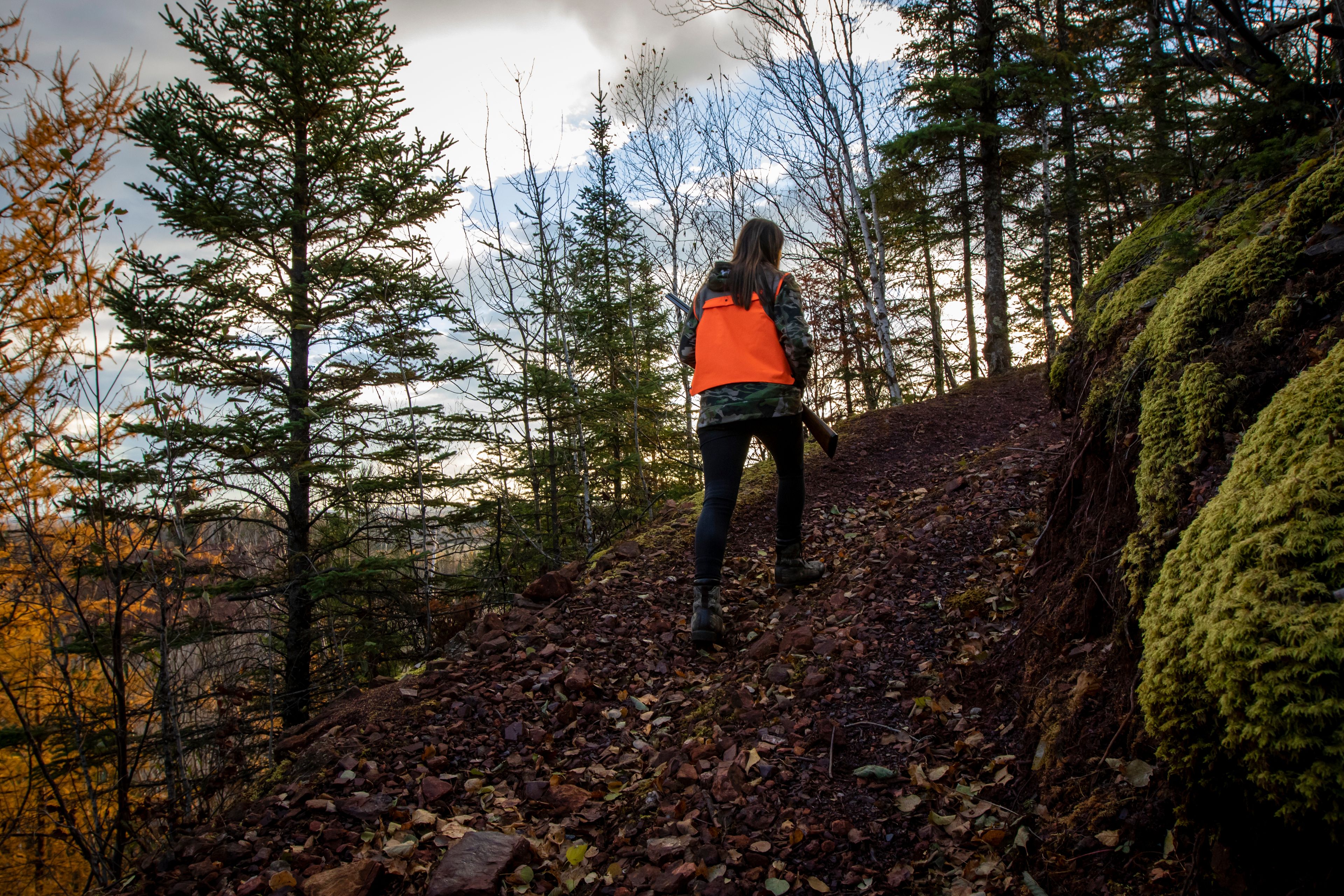 Portrait of young woman out hunting, Biwabik, Minnesota, USA