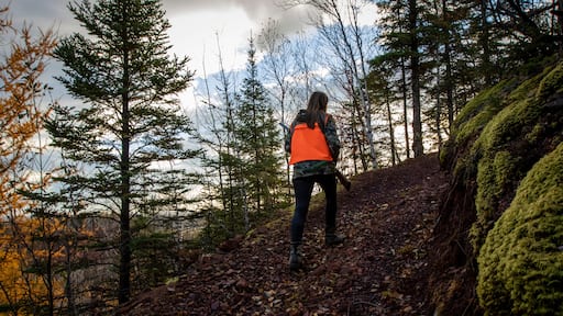 Portrait of young woman out hunting, Biwabik, Minnesota, USA