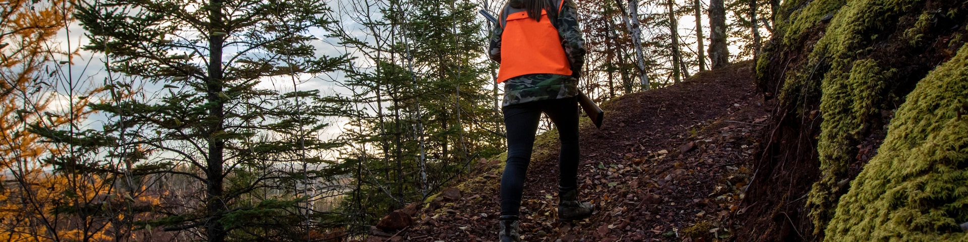 Portrait of young woman out hunting, Biwabik, Minnesota, USA