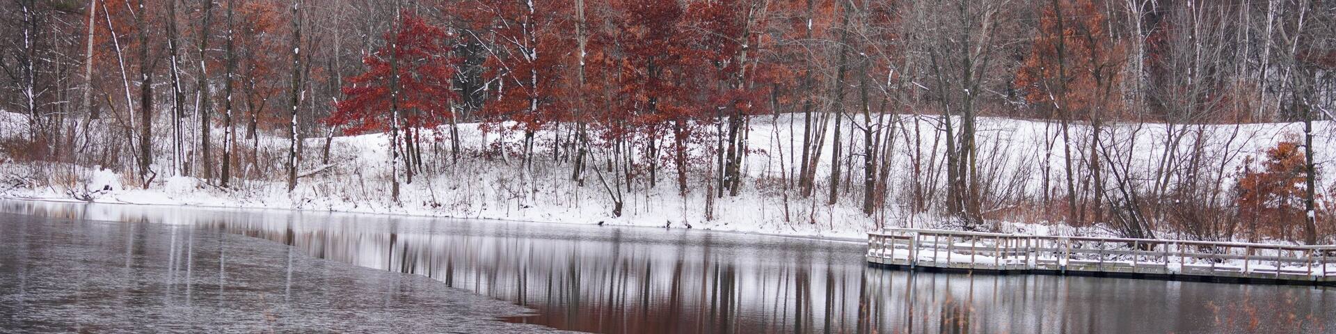 Reflections on a lake after a snow fall