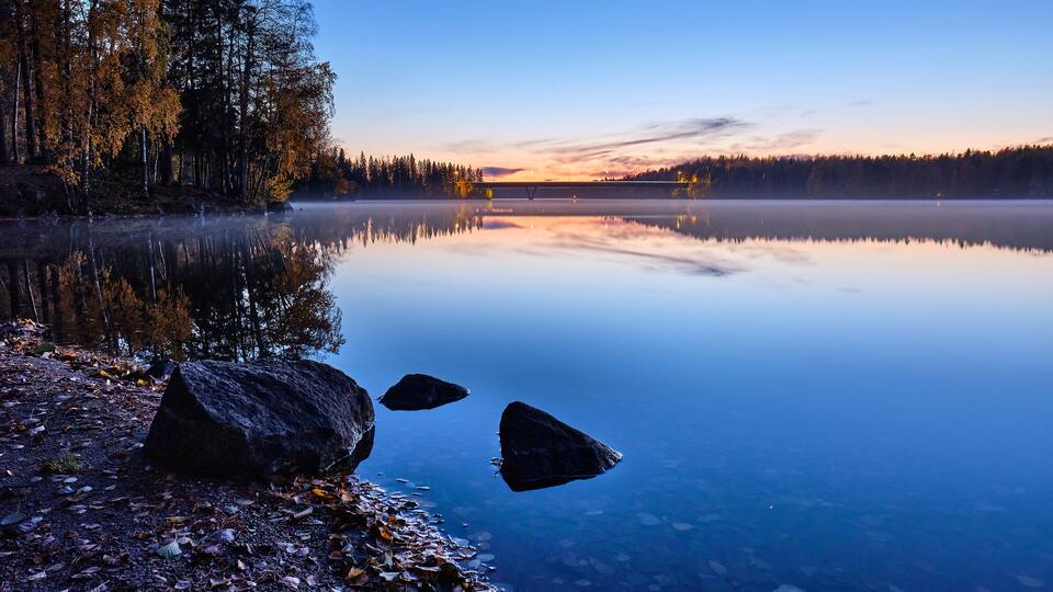 Foggy autumn calm lake