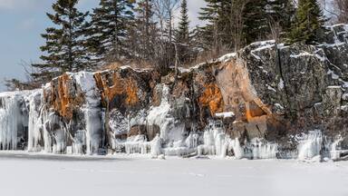Ice /snow covered Rock on the Lake Superior north shore in Grand Portage, Minnesota