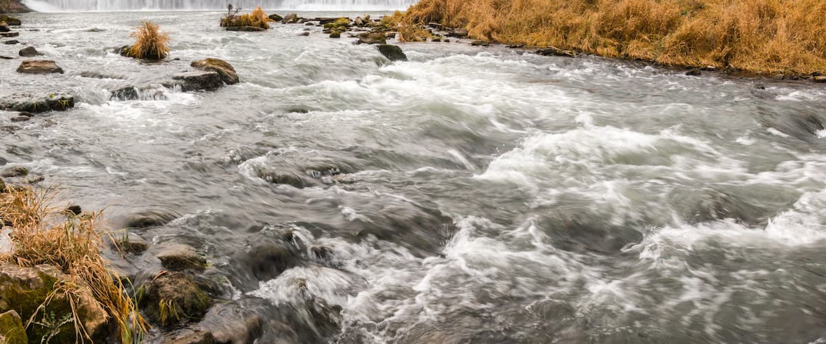The Root River Drops Over Root River Falls and the Historic Dam in Laneboro, Minnisota, USA