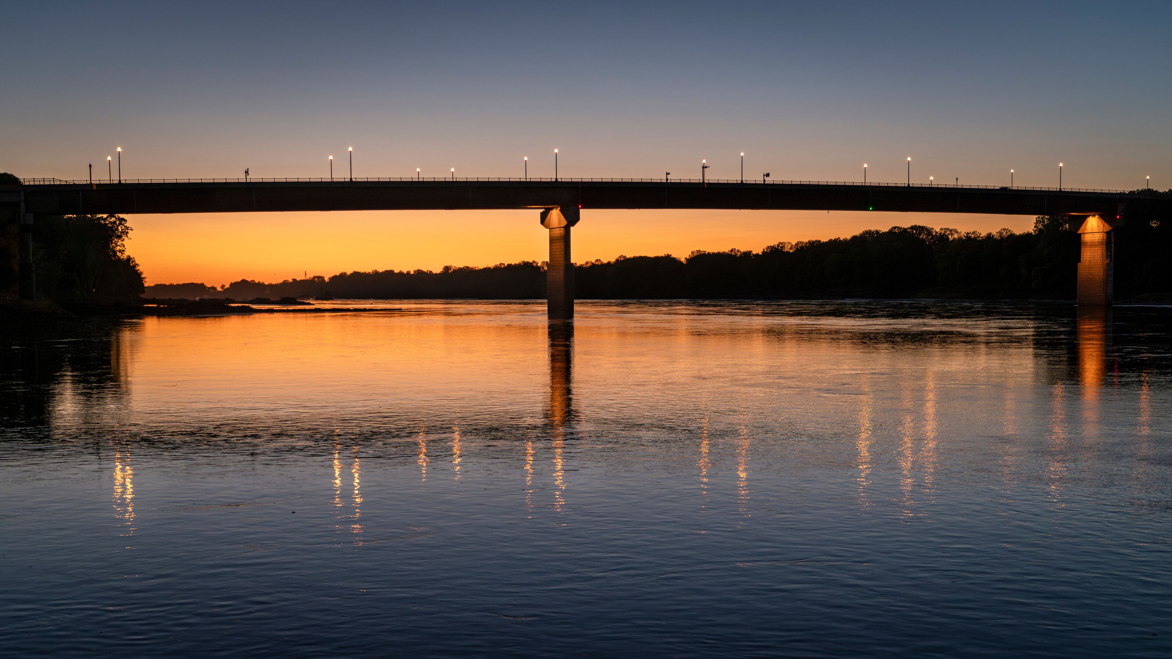 bridge over Missouri River at Hermann, MO, after sunset