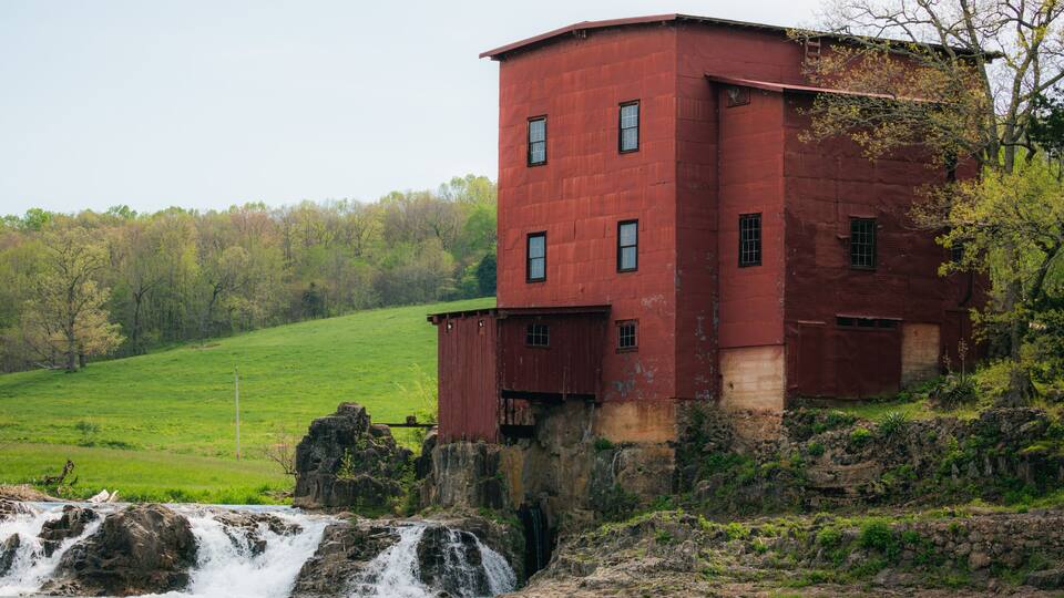 A historic red mill in the Ozarks of Missouri.