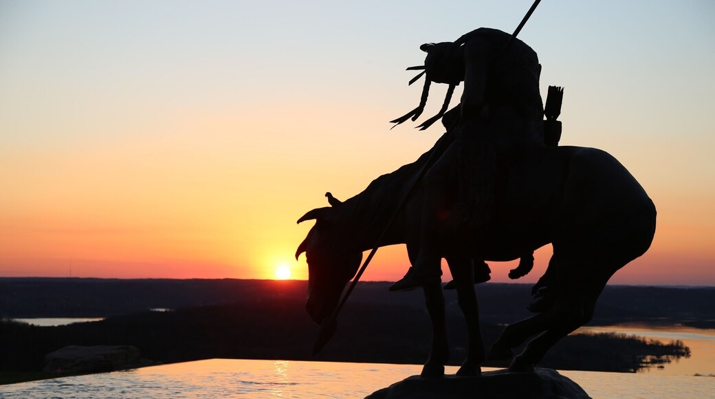 A lone warrior and the sunset over Table Rock Lake.