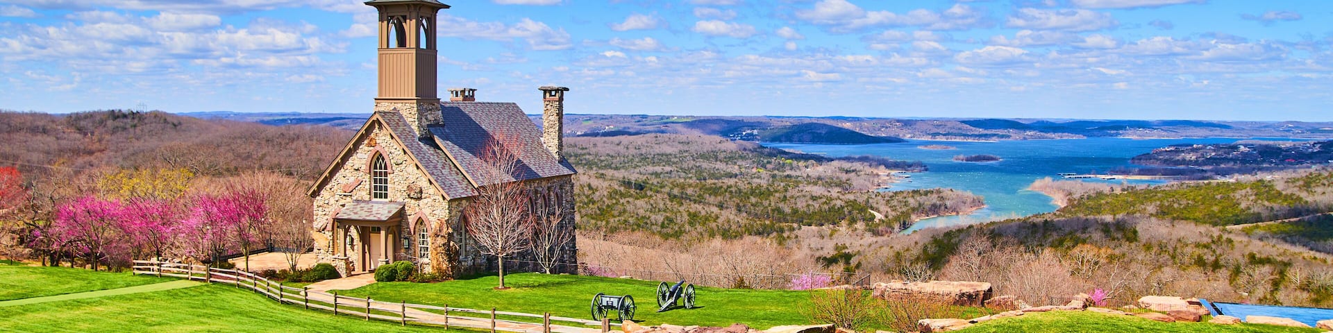 Stunning church on golf course overlooking lakes in early spring