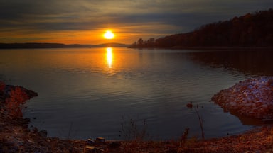 Small Cove at Sunset Peoples Creek Recreation Area Lake Wappapello Wayne County Missouri on November 19, 2021 The setting sun illuminates the shoreline of a small cove