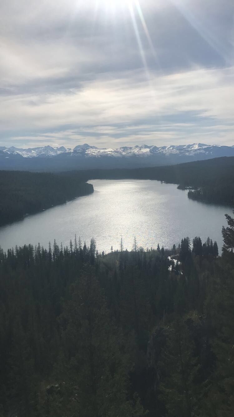 The view from Holland Lake right in front of a beautiful waterfall in Montana. 