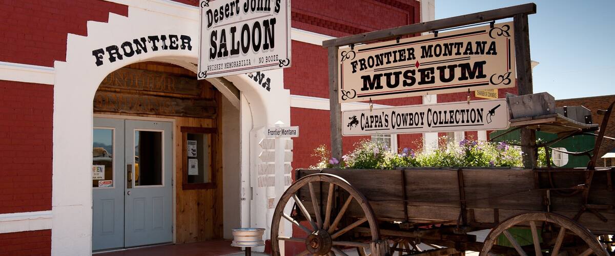 Deer Lodge featuring signage