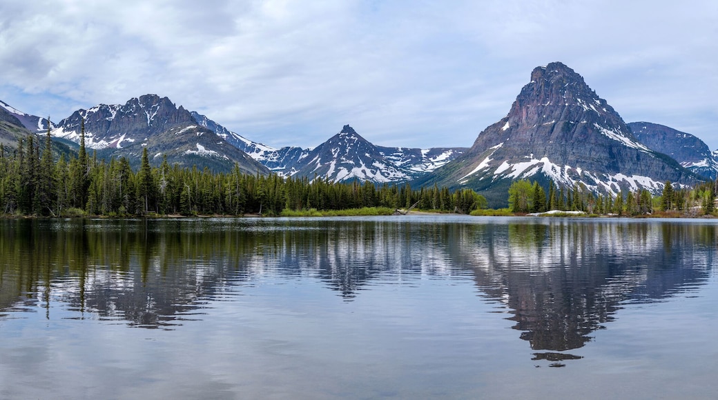 Pray Lake - A panoramic Spring morning view of Pray Lake and its surrounding mountains at Two Medicine Valley, Glacier National Park, Montana, USA.