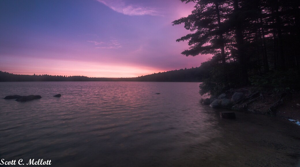 Willard Pond is located in Antrim NH which is in the Monadnock region of NH. Here's lots more info about the pond and the area around it. It's a great place for fishing! https://en.wikipedia.org/wiki/Willard_Pond
This photo was taken just before sunrise in mid-August. It was taken with a Canon 80D at 10mm, f/8, ISO 200 for 0.3 seconds. I used an ND16 medium graduated filter to hold down the exposure of the sky and a polarizer to knock down the glare on the water a bit.