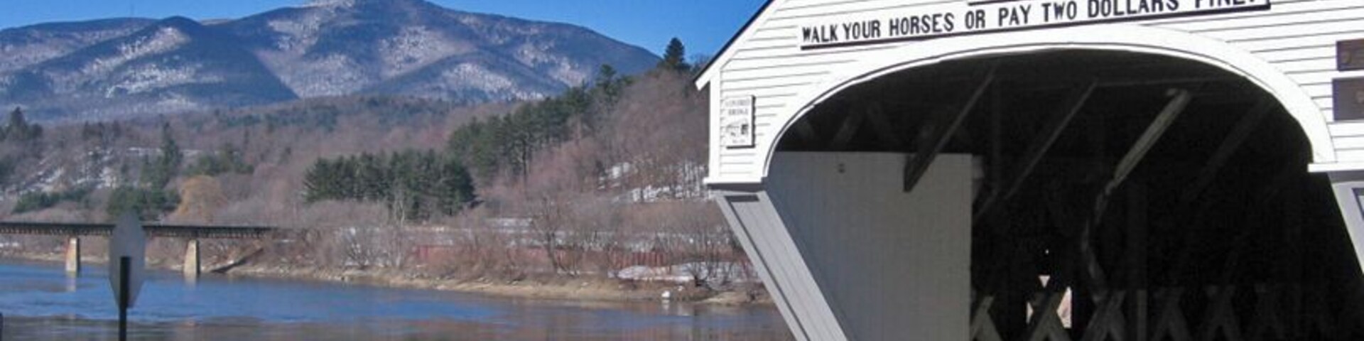 One of the prettiest covered bridges in New England, Cornish-Windsor spans the Connecticut River between Vermont and New Hampshire. #snow