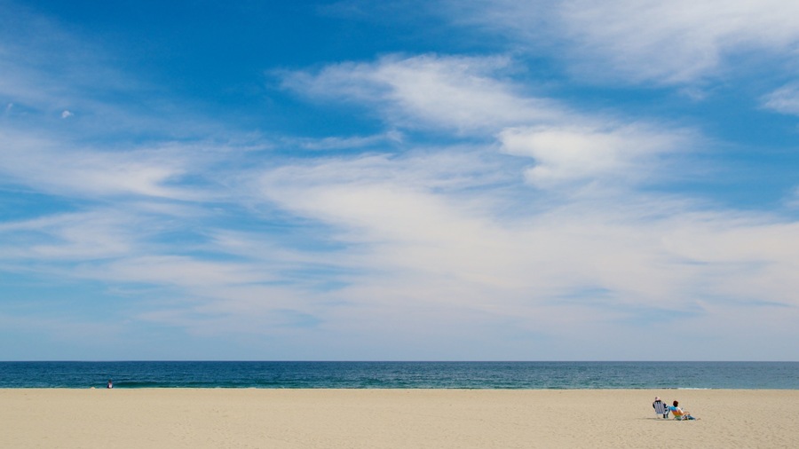 Hampton Beach featuring a sandy beach as well as a couple