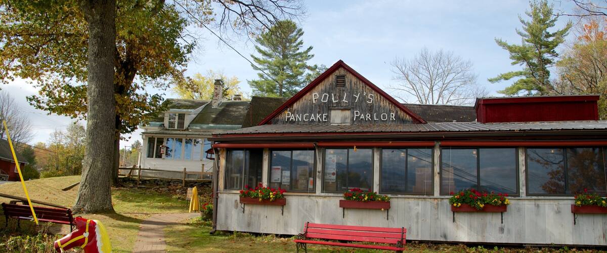 Sugar Hill showing signage and a playground