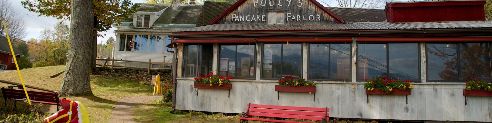 Sugar Hill featuring a playground and signage