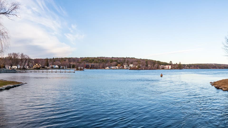 Late afternoon view of Lake Winnipesaukee from Meredith, New Hampshire, on a clear, crisp blue sky Spring afternoon.