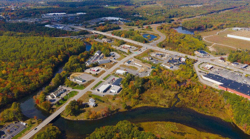 Interstate Highway 93 at Exit 20 with US Route 3 in White Mountain National Forest aerial view with fall foliage, Town of Tilton, New Hampshire NH, USA.