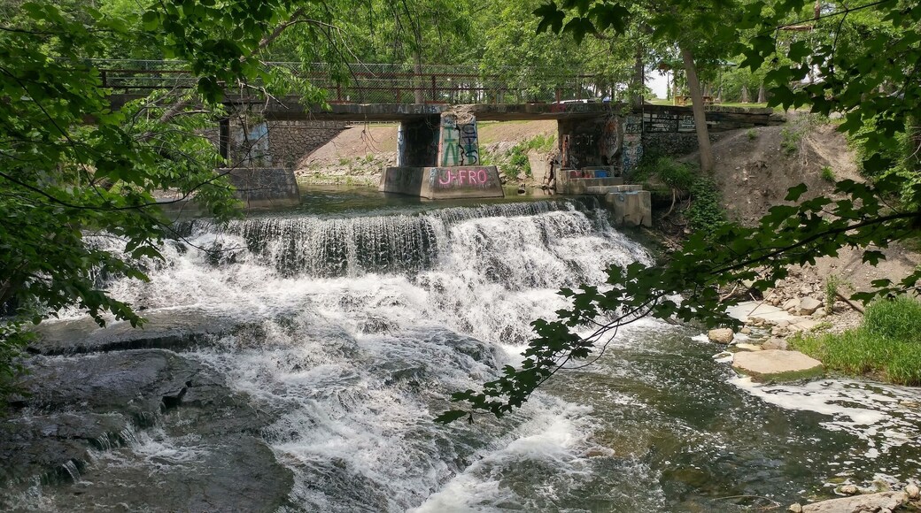 Papermill Falls with a graffiti bridge.