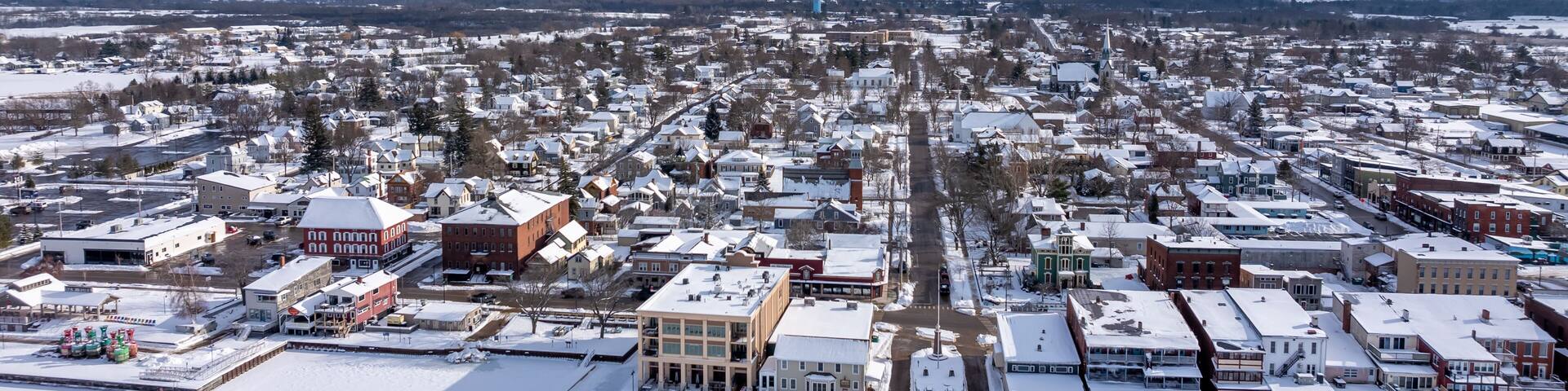 Clayton, NY, USA - 02-09-2025: Winter aerial image Clayton, NY along a frozen St Lawrence River