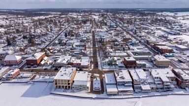 Clayton, NY, USA - 02-09-2025: Winter aerial image Clayton, NY along a frozen St Lawrence River