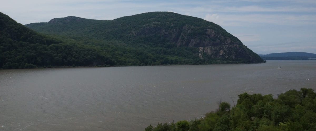 A river with hills in the background.