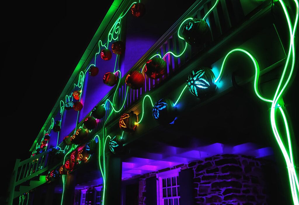 A building with colorful neon lights and decorations.