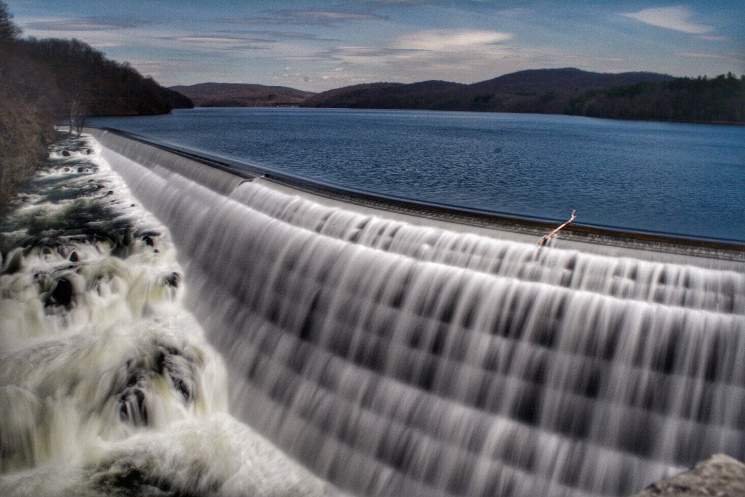 A dam with a waterfall.