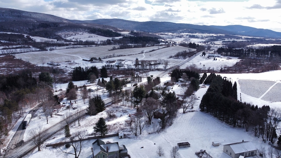 Bird's eye view of the cityscape of Hillsdale, New York under a cloudy sky in winter