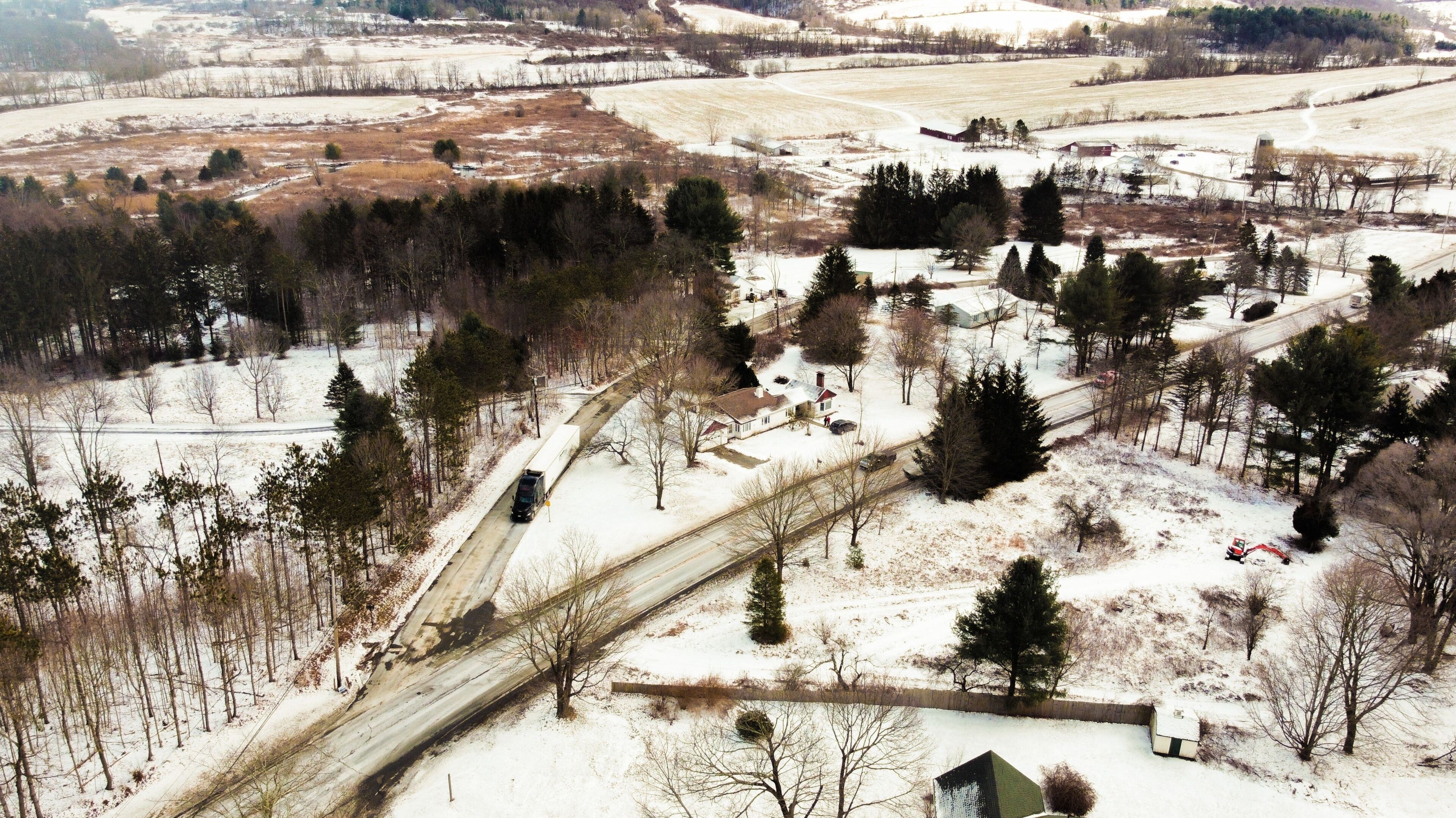 Bird's eye view of the cityscape of Hillsdale, New York under a cloudy sky in winter