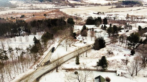 Bird's eye view of the cityscape of Hillsdale, New York under a cloudy sky in winter