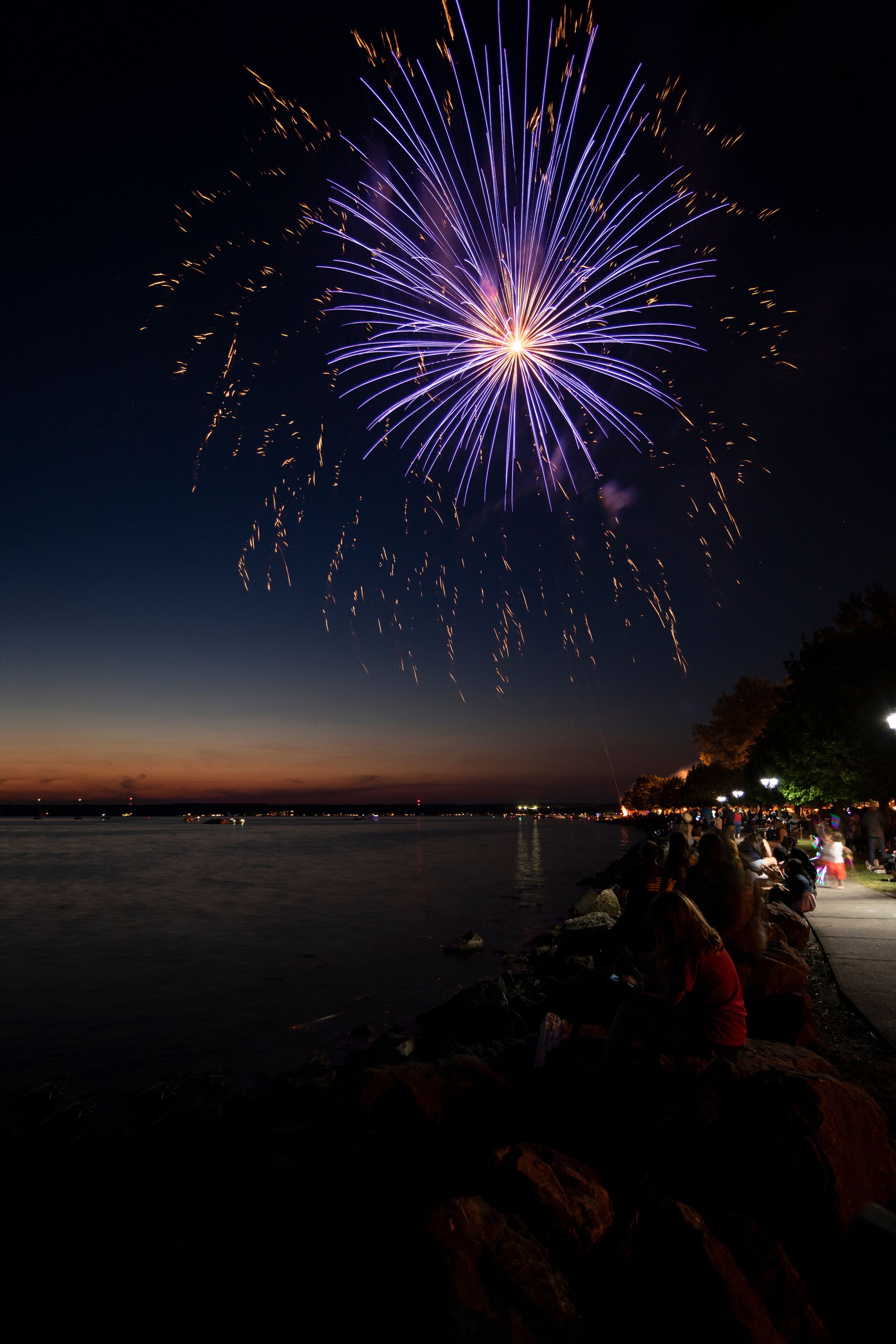 SYLVAN BEACH, NEW YORK - JULY 3, 2019: Fireworks and Celebration of the Independence at Sylvan Beach of Oneida Lake in Upstate New York.