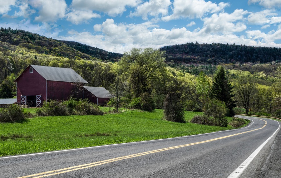 Scenic Drive in New York: Spring colors begin to show along a country road in the Catskill Mountains of southeastern New York.