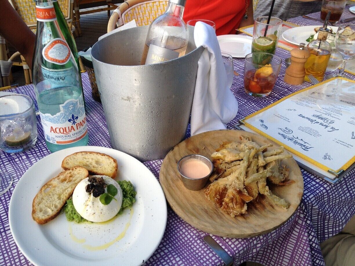 One of my favorite places, anywhere.  Reminiscent of the south of France, this little slice of heaven delivers every time.  Really cool French riverria vibe, with food and vin rose to boot.  Burratta on avocado puree with truffle oil, and fried artichoke hearts, with rose on ice (pictured) were only the beginning of yet another great al fresco meal, and memorable evening on Shelter Island.  We came by boat, anchored out, and swam in, but drive from the mainland, via the cute little 10 car ferry (part of the charm of making the trip).  Love, love this spot.