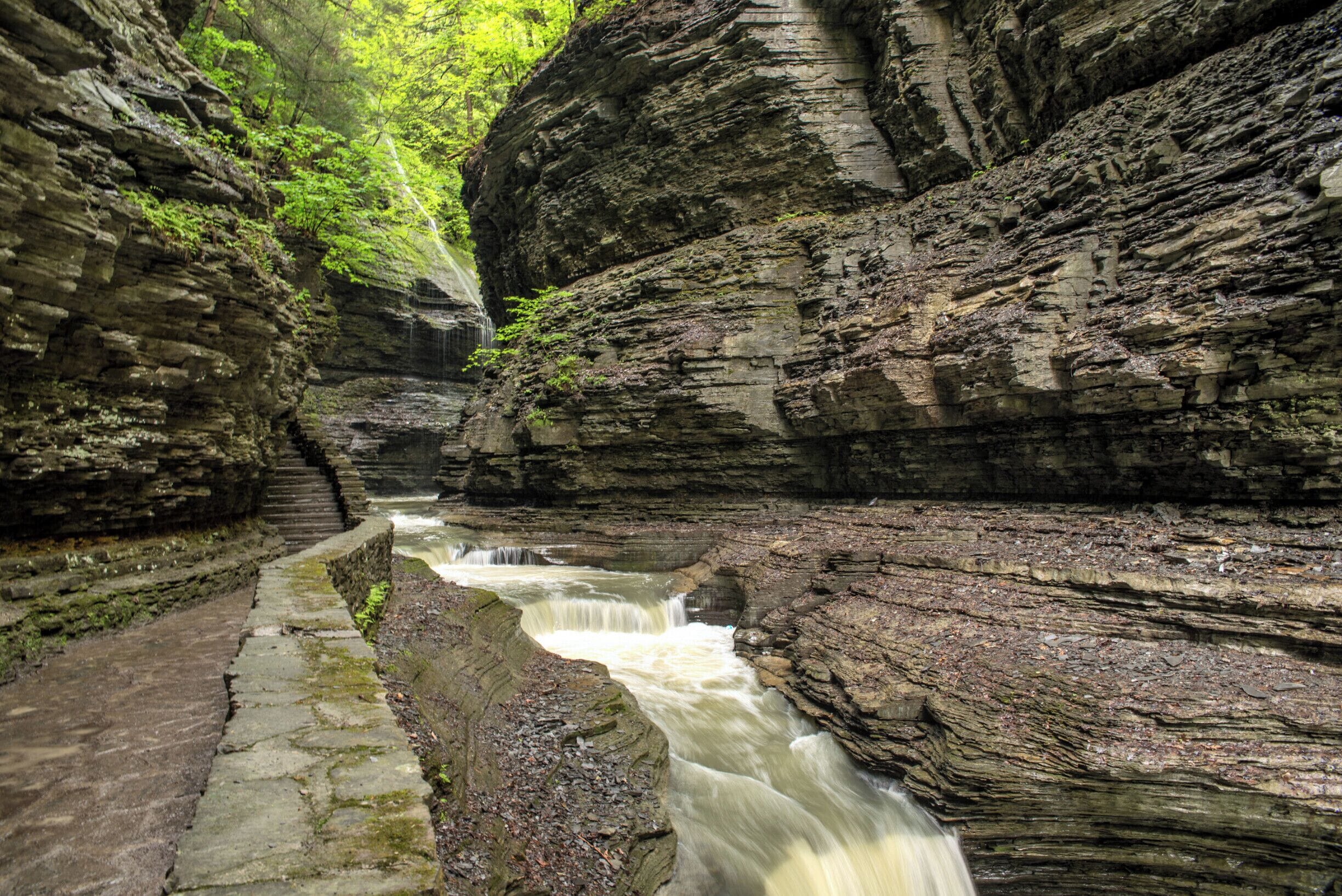 The amazing Gorge Trail at Watkins Glen State Park is an absolute must-do! There are 19 different watefalls on this incredible 2-mile hike. It's a relatively easyhike, but there are a lot of stairs. Also, bring a raincoat or something to protect your camera - it's easy to get wet!