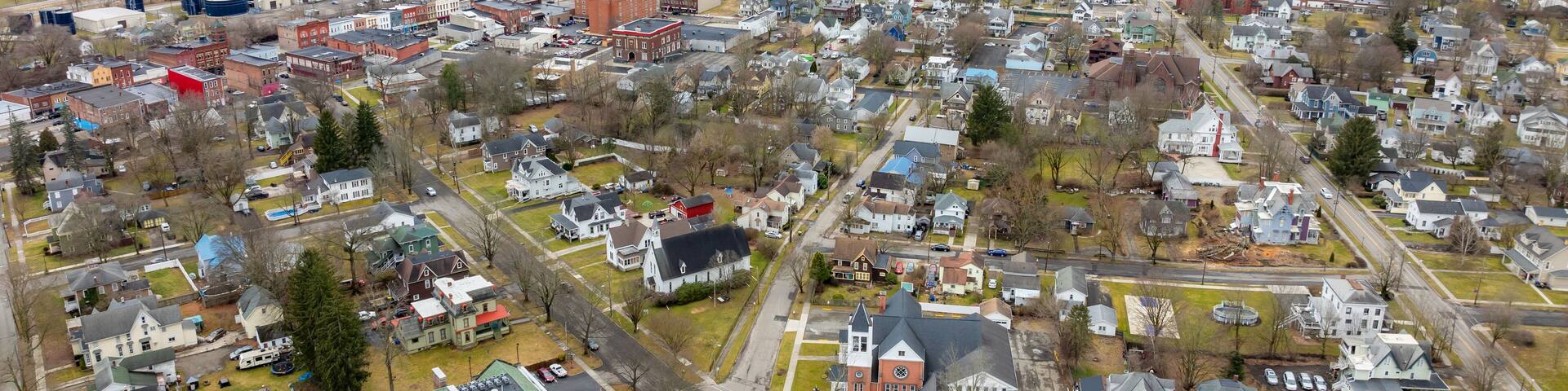 Waverly, NY, USA - 03-03-2024 - Cloudy winter aerial image of the downtown area in the Village of Waverly, NY.