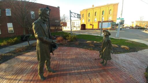 Lincoln statue at Lincoln-Bedell Park. It is a tribute to a local girl who suggested President-Elect Lincoln wear a beard as president.