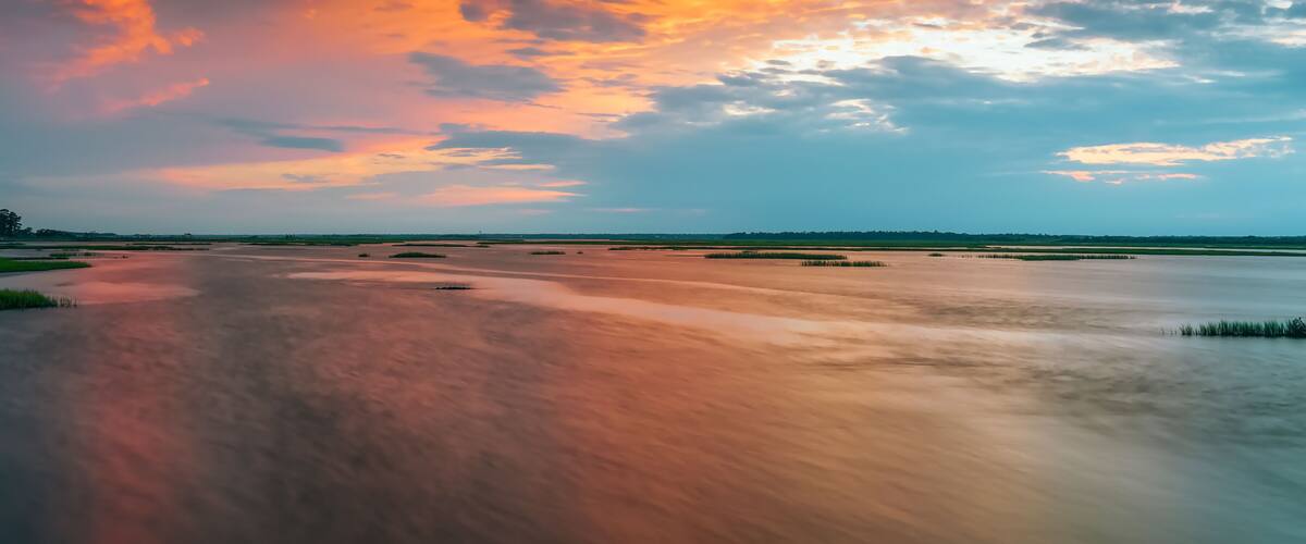 A river with a sunset sky.