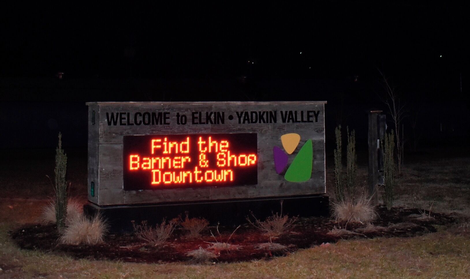 Welcome sign in Elkin, North Carolina. Downtown Elkin is marketed as a historic and quaint town in the Yadkin Valley. It is funny to see this contrasted by an electronic welcome board. This board did not exist until the sometime in the past couple years or so. It makes you wonder why they chose to choose a more modern looking sign when they also want to keep the historic and quaint vibe that they market. In a way, I guess it is their way of integrating more modern technology to keep up with the times, and as a money making opportunity. 
#appalachianechoes