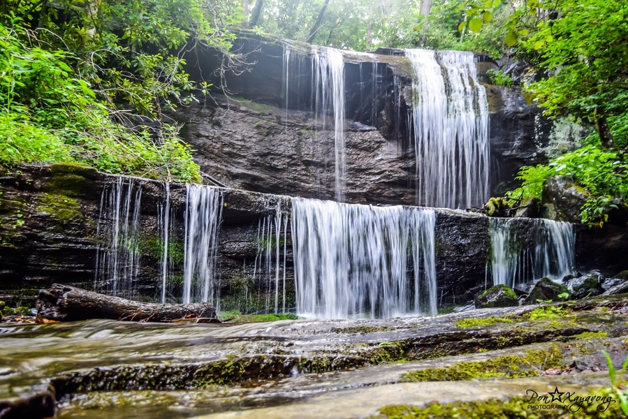 Grassy Creek Falls! The parking area is very near the exit on the Blue Ridge Parkway for Little Switzerland milepost 334. The waterfalls is on private property but open to the public.