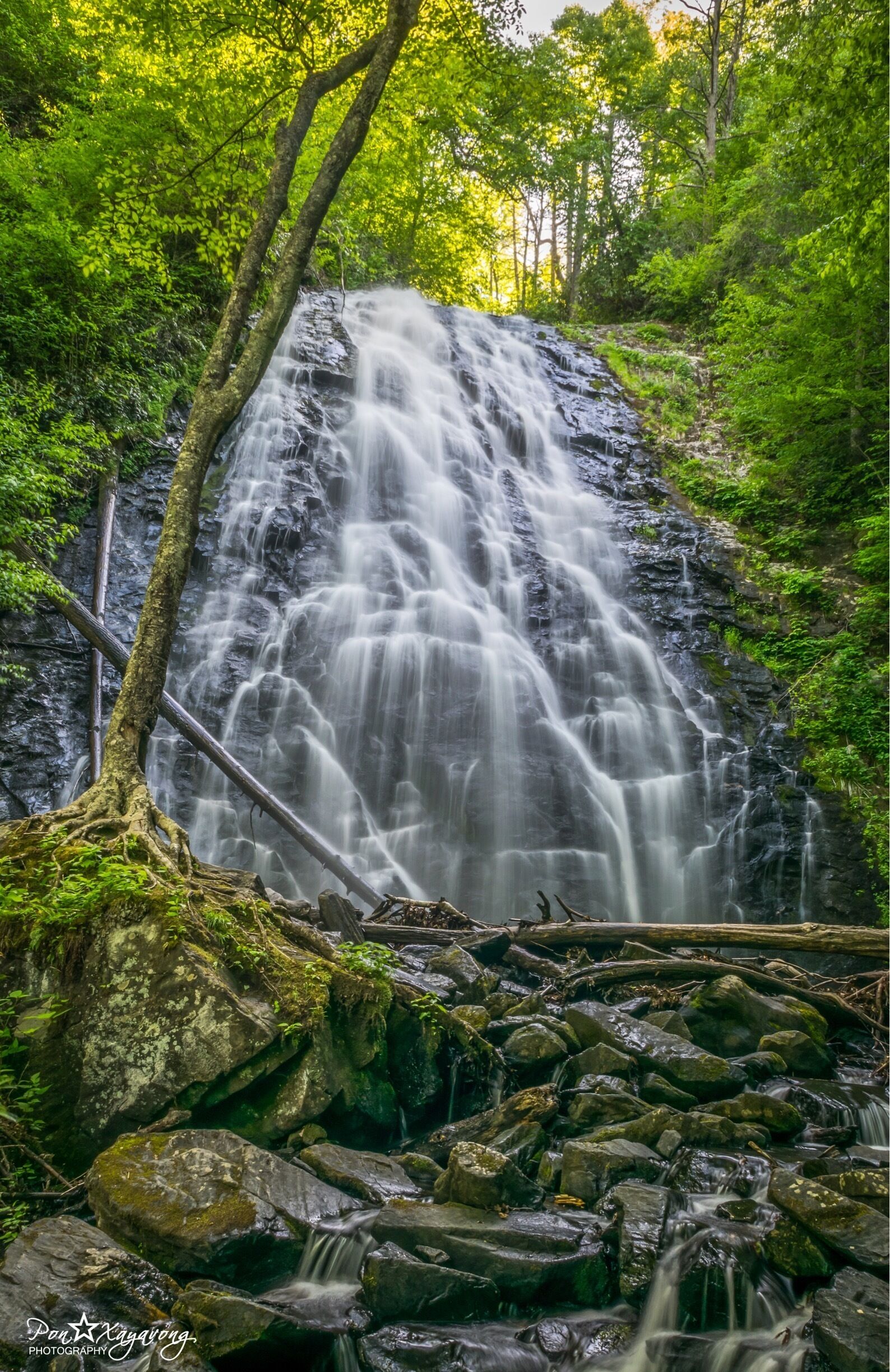 Crabtree Falls is a 70 ft. cascade on Big Crabtree Creek. The creek spreads over a rock face with many small ledges, giving it a delicate appearance, before trickling into a clear pool at the base.