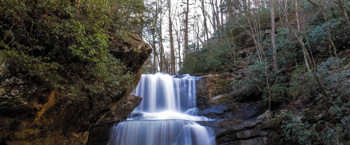 The beautiful Little Bradley Falls which is much easier (and safer) to reach that the larger Big Bradley Falls. A pleasant walk through the forest will lead you to this beauty although there is a creek crossing that require you to get your feet wet if the water level is high. For a video guide of this hike, please visit: https://www.hdcarolina.com/episode/little-bradley-falls
